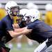 Saline High School football practice in the rain at the school on Monday, August 12, 2013. Melanie Maxwell | AnnArbor.com